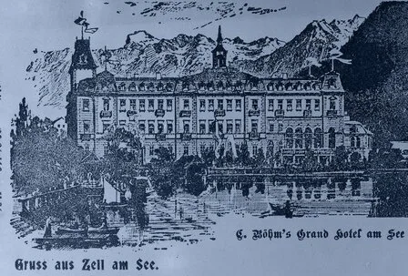 Historische Illustration des Grand Hotel am See mit Blick über das Wasser und Berge im Hintergrund.